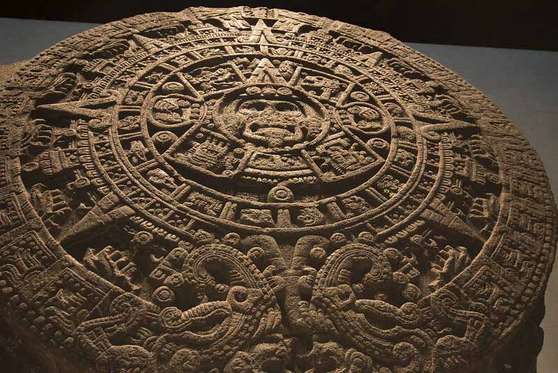 Aztec calendar stone, Sun Stone, or Stone of the Five Eras by Antonio Acuna